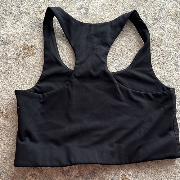 Black girlfriend collective sports bra. Gently used. Size medium. - Picture 2 of 2